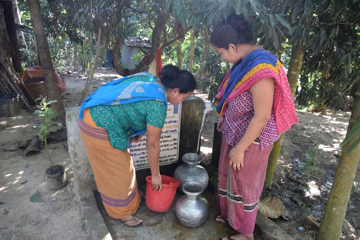 Women are collecting water from solar-powered taps in Jurachhari Upazila, Rangamati Hill District, Bangladesh-Photo by Rafiqul Islam Montu